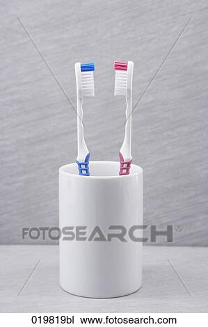 two toothbrushes face to face View Large Photo Image Stock Image - two toothbrushes face to face. Fotosearch
