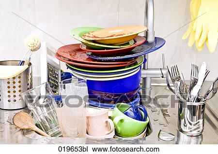 Stock Image - washing-up in kitchen sink. Fotosearch