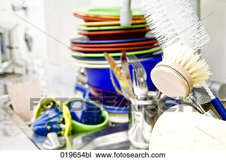 Stock Image - washing-up in kitchen sink. Fotosearch
