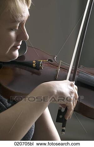 woman playing violin View Large Photo Image Stock Image - woman playing violin. Fotosearch