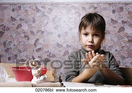 young girl working with clay View Large Photo Image Stock Image - young girl working with clay. Fotosearch