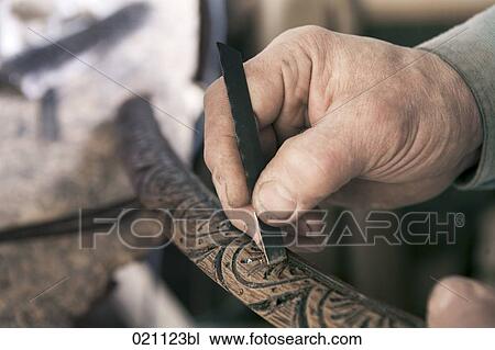close-up of carpenter carving piece of wood View Large Photo Image Stock Image - close-up of carpenter carving piece of wood. Fotosearch