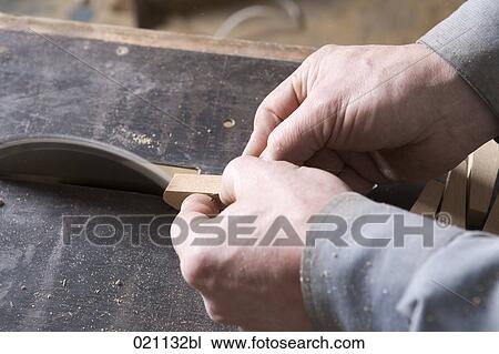 close-up of carpenter cutting piece of wood with buzz saw View Large Photo Image Stock Image - close-up of carpenter cutting piece of wood with buzz saw. Fotosearch