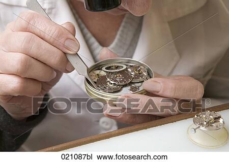 close-up of female watchmaker at work View Large Photo Image Stock Image - close-up of female watchmaker at work. Fotosearch