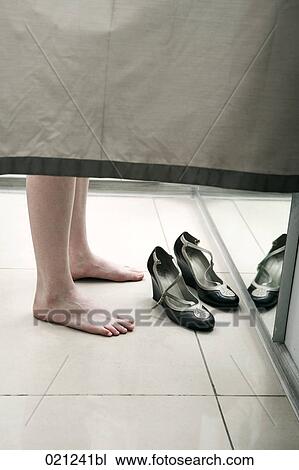 detail of teenage girl in changing room with pair of shoes View Large Photo Image Stock Image - detail of teenage girl in changing room with pair of shoes. Fotosearch