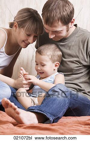 family with young child View Large Photo Image Stock Image - family with young child. Fotosearch