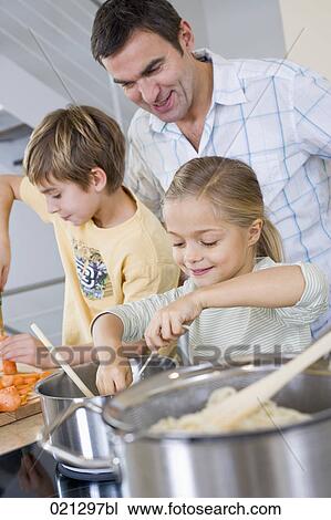 father watching his children cook View Large Photo Image Stock Image - father watching his children cook. Fotosearch
