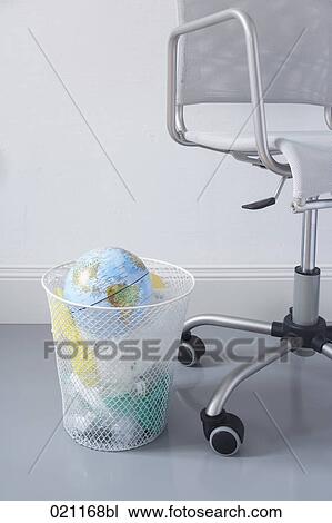 globe in wastebasket in office View Large Photo Image Stock Image - globe in wastebasket in office. Fotosearch