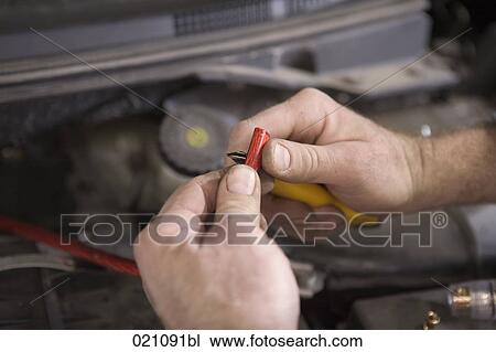 mechanic cutting cable with knife View Large Photo Image Stock Image - mechanic cutting cable with knife. Fotosearch