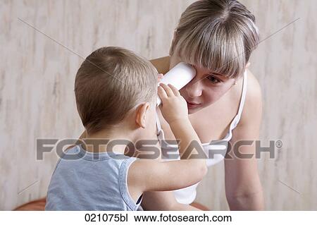 Stock Image - mother playing with her young son. Fotosearch
