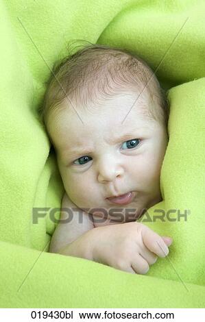 portrait of baby wrapped in green blanket View Large Photo Image Stock Image - portrait of baby wrapped in green blanket. Fotosearch