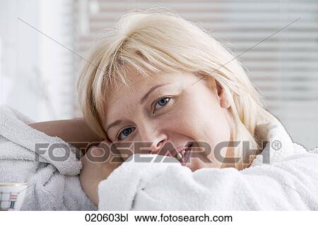 portrait of blonde woman in bathrobe View Large Photo Image Stock Image - portrait of blonde woman in bathrobe. Fotosearch