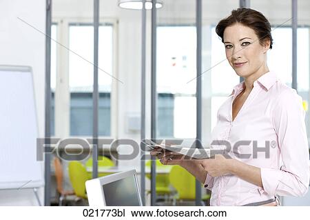 portrait of businesswoman with documents View Large Photo Image Stock Image - portrait of businesswoman with documents. Fotosearch