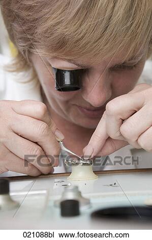 portrait of female watchmaker at work View Large Photo Image Stock Image - portrait of female watchmaker at work. Fotosearch