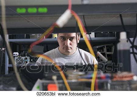 portrait of man working at computer repair shop View Large Photo Image Stock Image - portrait of man working at computer repair shop. Fotosearch