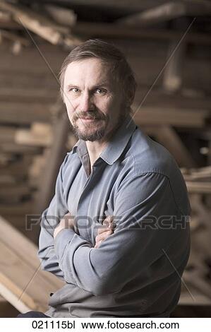 portrait of mature carpenter in his workshop View Large Photo Image Stock Image - portrait of mature carpenter in his workshop. Fotosearch