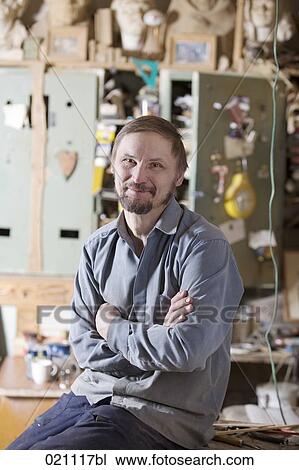portrait of mature carpenter in his workshop View Large Photo Image Stock Image - portrait of mature carpenter in his workshop. Fotosearch