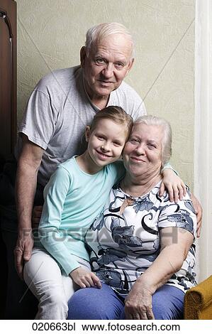 portrait of mature couple with granddaughter View Large Photo Image Stock Image - portrait of mature couple with granddaughter. Fotosearch