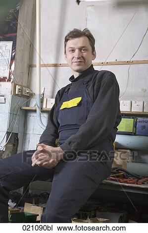 portrait of mechanic in his workshop View Large Photo Image Stock Image - portrait of mechanic in his workshop. Fotosearch