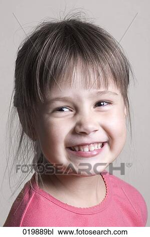 Stock Image - portrait of smiling young girl. Fotosearch