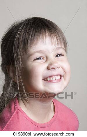 portrait of smiling young girl View Large Photo Image Stock Image - portrait of smiling young girl. Fotosearch