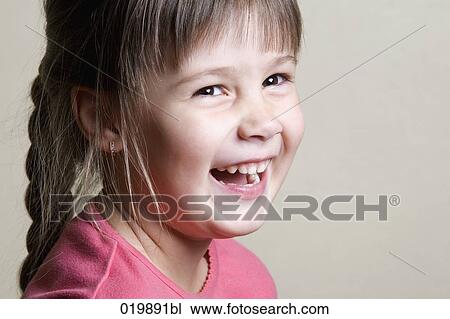 portrait of smiling young girl View Large Photo Image Stock Image - portrait of smiling young girl. Fotosearch