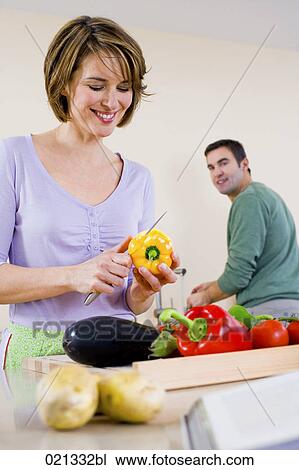 portrait of woman cutting vegetables View Large Photo Image Stock Image - portrait of woman cutting vegetables. Fotosearch