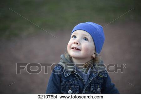 portrait of young boy looking up to the sky View Large Photo Image Stock Image - portrait of young boy looking up to the sky. Fotosearch