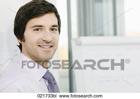Stock Image - portrait of young businesswoman. Fotosearch