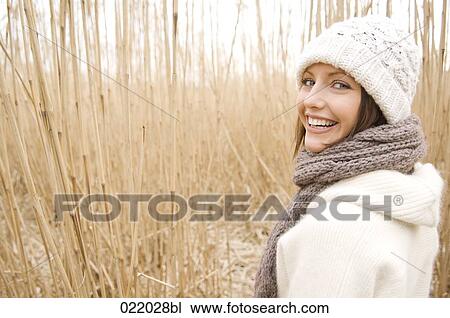 Stock Image - portrait of young woman in autumn. Fotosearch