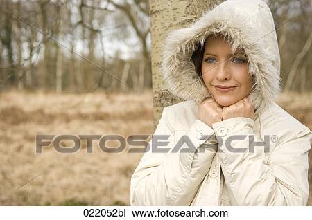 portrait of young woman in autumn View Large Photo Image Stock Image - portrait of young woman in autumn. Fotosearch