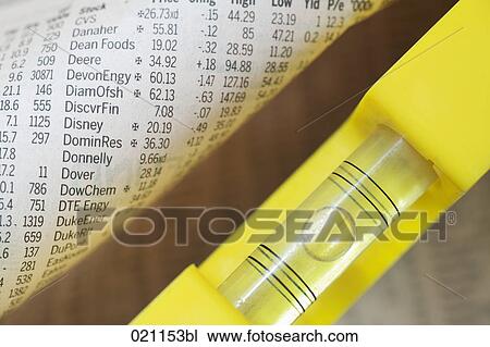 spirit-level and page of business paper View Large Photo Image Stock Image - spirit-level and page of business paper. Fotosearch