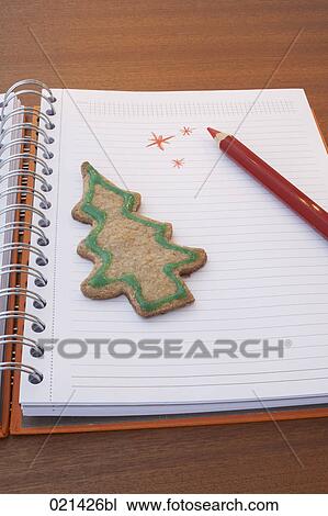 still life of christmas cookie on diary View Large Photo Image Stock Image - still life of christmas cookie on diary. Fotosearch