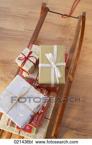 still life of christmas present on sledge View Large Photo Image Stock Image - still life of christmas present on sledge. Fotosearch
