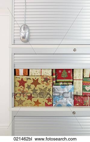 still life of christmas presents in filing cabinet View Large Photo Image Stock Image - still life of christmas presents in filing cabinet. Fotosearch