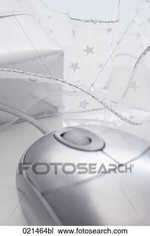 still life of computer mouse and present View Large Photo Image Stock Image - still life of computer mouse and present. Fotosearch