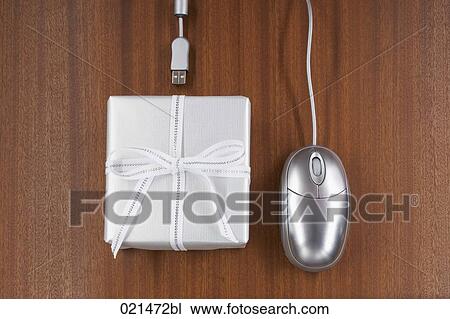 still life of computer mouse and present View Large Photo Image Stock Image - still life of computer mouse and present. Fotosearch