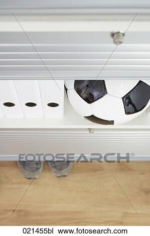 still life of football in filing cabinet View Large Photo Image Stock Image - still life of football in filing cabinet. Fotosearch