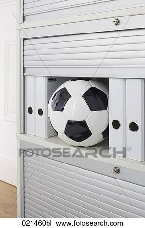 still life of football in filing cabinet View Large Photo Image Stock Image - still life of football in filing cabinet. Fotosearch