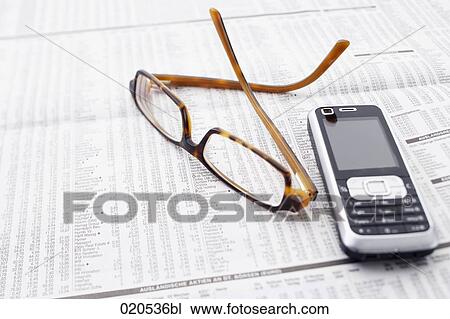 still life of glasses and mobile phone on business paper View Large Photo Image Stock Image - still life of glasses and mobile phone on business paper. Fotosearch