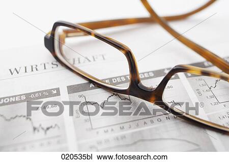 still life of glasses on business paper View Large Photo Image Stock Image - still life of glasses on business paper. Fotosearch