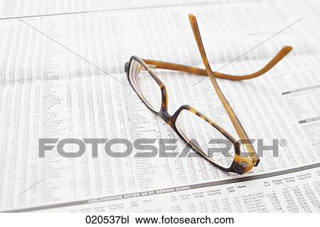 still life of glasses on business paper View Large Photo Image Stock Image - still life of glasses on business paper. Fotosearch