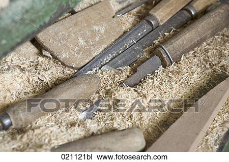 Stock Image - still life of knifes for cutting wood. Fotosearch