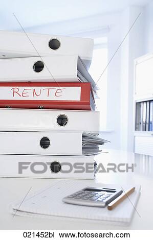 still life of pile of folders with calculator on table View Large Photo Image Stock Image - still life of pile of folders with calculator on table. Fotosearch