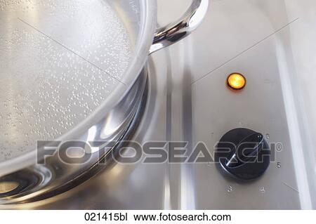 still life of pot full with water on stove View Large Photo Image Stock Image - still life of pot full with water on stove. Fotosearch