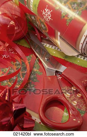 Stock Image - still life of scissors and wrapping paper for christmas. Fotosearch