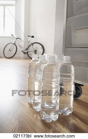 water in plastic bottles on the floor View Large Photo Image Stock Image - water in plastic bottles on the floor. Fotosearch