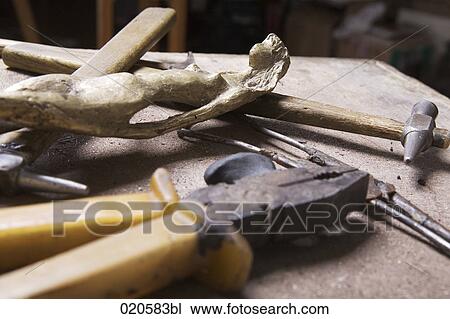 wooden statue and tools in workshop View Large Photo Image Stock Image - wooden statue and tools in workshop. Fotosearch