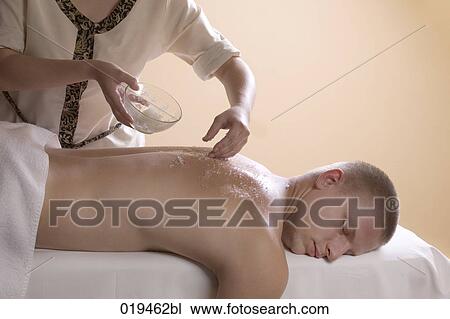 young man getting massage treatment View Large Photo Image Stock Image - young man getting massage treatment. Fotosearch