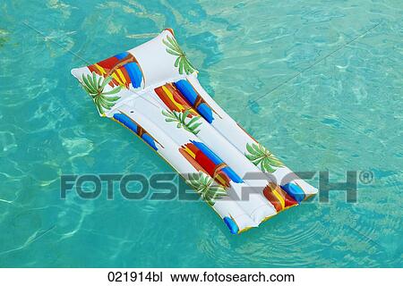 air bed floating in swimming pool View Large Photo Image Stock Image - air bed floating in swimming pool. Fotosearch